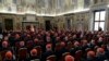 Pope Benedict XVI addressing a meeting of cardinals during his last such meeting at the Vatican on February 28.