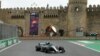 Azerbaijan-Formula One - F1 - Azerbaijan Grand Prix - Baku City Circuit, Baku, Azerbaijan - April 29, 2018 Ferrari's Sebastian Vettel and Mercedes' Lewis Hamilton in action during the race REUTERS/David Mdzinarishvili