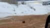 The photos of the road appeared on Russian social media. 