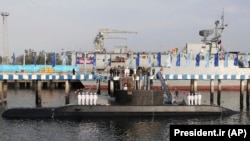 The inauguration of the Iranian-made Fateh (Conqueror) submarine in the southern port of Bandar Abbas on February 17.