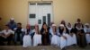 Yazidis attend a commemoration marking the third anniversary of the Yazidi genocide in the Sinjar region of Iraq on August 3. 