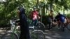 Men and women cycling in Iran. File photo