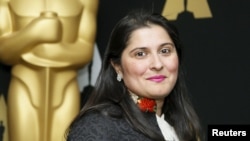 Sharmeen Obaid-Chinoy from the Oscar-nominated documentary short subject A Girl in the River: The Price of Forgiveness poses at a reception ahead of the upcoming 88th Academy Awards ceremony in Beverly Hills on February 24.