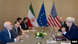 На снимке: участники очередного раунда переговоров по ядерной проблеме Ирана в Женеве