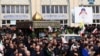 People attend the funeral of IRGC spokesman Ali Mohammad Naini after Eid al-Fitr prayers in Tehran on March 21.