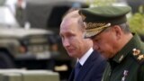 Россия. Владимир Путин и Сергей Шойгу на военно-техническом Форуме "Армия-2015". Подмосковье, Кубинка, 16.06.2015