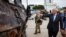 British Prime Minister Boris Johnson views destroyed Russian military equipment during a June 17 visit to Ukraine.