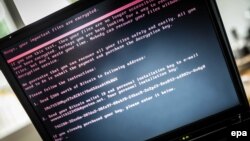 Екран ноутбука з повідомленням після зараження вірусом під час всесвітньої кібератаки. Нідерланди, 27 червня 2017 року