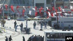 Police investigate the area where a suicide bomber blew himself up in the center of Istanbul.