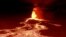 SPAIN -- Night drone shot of Volcano erupting and tongues of lava in La Palama, September 22, 2021