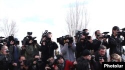 Armenia -- TV cameramen and photographers cover an event in Yerevan.