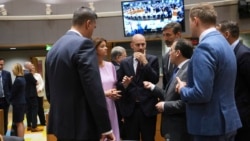 French Foreign Minister Jean-Noel Barrot (center) speaks with European counterparts in Brussels on June 23. 