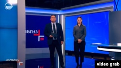Ведущие главного информационного выпуска «Хроника 20:00» на «Имеди» — Леван Джавахишвили и Хатия Кватадзе