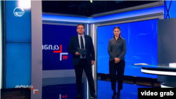 „იმედის“ მთვარი საინფორმაციო გამოშვება „ქრონიკა 20:00 საათზე“: გადაცემის წამყვანები ლევან ჯავახიშვილი და ხატია ქვათაძე.
