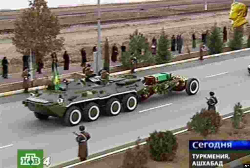 An armored personnel carrier tows Niyazov's funeral bier to his family crypt in Kipchak (AFP) - "This was a protocol meeting," he said. "They discussed the gas situation in general terms. Ukraine hopes for continuity in relations with the new [Turkmen] president and hopes that nothing will change in the gas agreements and that those agreements will be adhered to."