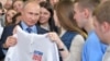 Russian President Vladimir Putin visits his election campaign office in Moscow on January 10.