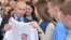 Russian President Vladimir Putin visits his election campaign office in Moscow on January 10.