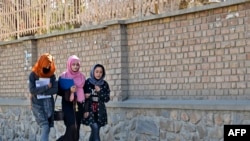 Students near the Kabul University. February, 2022.
