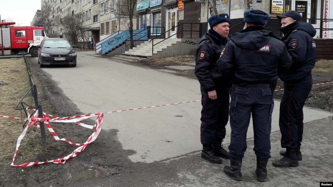 Russian police officers secure a residential area in St. Petersburg on April 6.