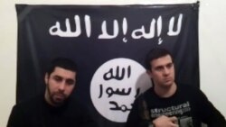Кадр размещенной в Интернете видеозаписи, на которой запечатлены предполагаемые члены группировки "Ансар аль-Сунна", 20 января 2014 года. 