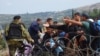 Migrants Storm Macedonian Border
