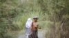 Flood victims forced to live in a temporary shelter in Muzaffarabad in the Pakistani administered Kashmir region