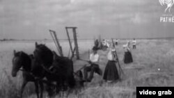 A screen shot of Ukrainian peasants from "The Harvesters' Song," a British Pathé news clip that was made in 1935