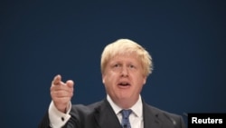 Britain's Foreign Secretary Boris Johnson speaks at the annual Conservative Party Conference in Birmingham, on October 2.