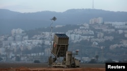 An Israeli Iron Dome rocket interceptor battery is deployed near the northern city of Haifa on January 28, one of two deployed to the area.