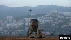 An Israeli Iron Dome rocket interceptor battery is deployed near the northern city of Haifa on January 28, one of two deployed to the area.