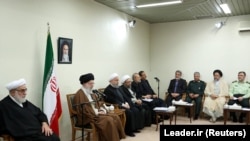 Iran's Supreme Leader Ayatollah Ali Khamenei meets with Iranian President Hassan Rouhani and other officials, in Tehran, Iran November 15, 2017. Rouhani and a few others named in the book are seen in this photo.
