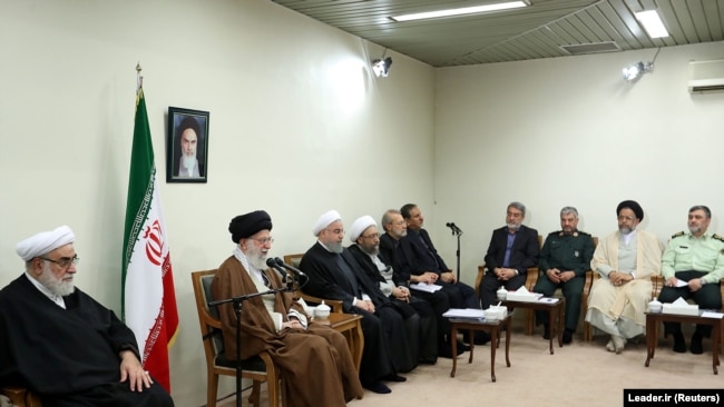 Iran's Supreme Leader Ayatollah Ali Khamenei meets with Iranian President Hassan Rouhani and other officials, in Tehran, Iran November 15, 2017. Rouhani and a few others named in the book are seen in this photo.