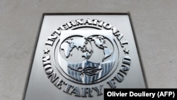 U.S. -- An exterior view of the building of the International Monetary Fund (IMF), with the IMG logo, is seen in Washington, March 27, 2020