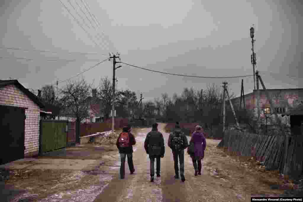 Students on their way to school. Some spend two hours traveling to school by bus and train. 