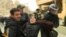 Azerbaijan -- Ata Abdullayev being detained by police during the opposition protest in Baku, 17Apr2011