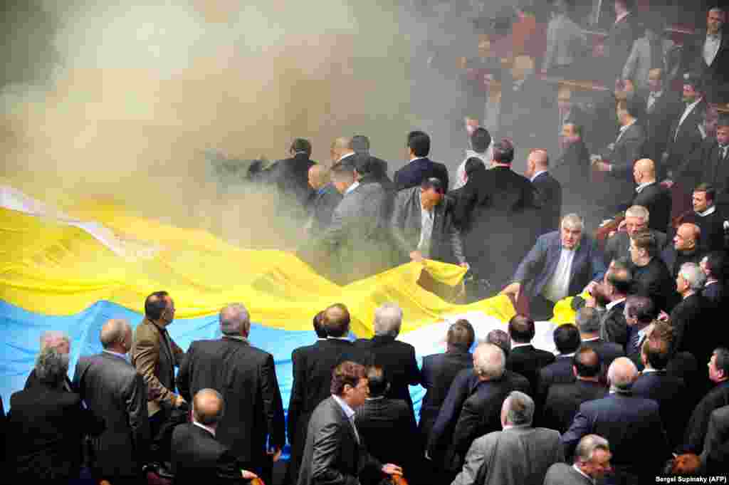 Smoke bombs and a giant flag made Ukraine&#39;s parliament look more like a gathering of football ultras than an assembly of politicians during the debate on Russia&#39;s Crimea base in April 2010.&nbsp;