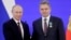 Russian President Vladimir Putin (left) awarded Nikolai Malinov, the head of a pro-Russian lobby group in Bulgaria, the Order of Friendship on November 4. 