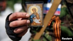 Прарасейскі сэпаратыст з абразом, архіўнае фота