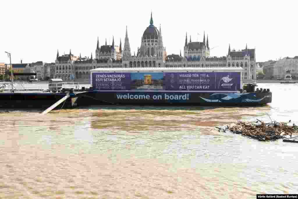 A floating dock is now inaccessible due to the rising water levels.