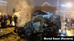 A car bomb hit a police vehicle late on December 10 shortly before a suicide bomber detonated a suicide vest outside a stadium in Istanbul.