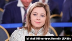 RUSSIA -- Natalia Poklonskaya, Deputy Chairman of the State Duma Committee on Security and Anti-Corruption, before the speech of Russian President Vladimir Putin with the annual message to the Federal Assembly in the Central Exhibition Hall "Manezh", Marc