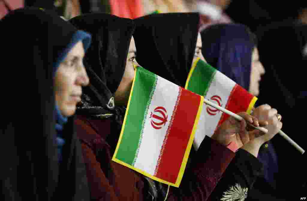 Supporters of Iranian conservative presidential candidate and Tehran Mayor Mohammad Baqer Qalibaf attend a campaign rally in the capital, Tehran, on May 11. (AFP/Atta Kenare)