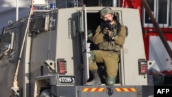 تصویری از یک سرباز اسرائیلی در کرانه باختری