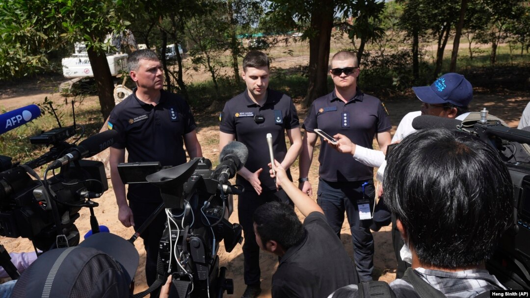 Ukrainian deminers hold a press briefing during a visit to the Peace Museum Mine Action in Siem Reap Province, northwestern Cambodia, on January 20.