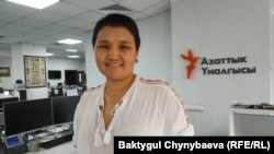 Рита Карасартова.