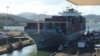 President Donald Trump wants free passage for US ships through the Panama (pictured) and Suez Canals.