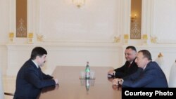 President of Azerbaijan Ilham Aliev (right) meets Belarus KGB chief Vadim Zaycau (Left), May 3, 2011