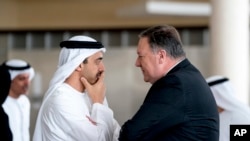 Secretary of State Mike Pompeo, right, and United Arab Emirates Foreign Minister Sheikh Abdullah bin Zayed Al Nahyan, left, speak together at the Al Shati Palace in Abu Dhabi‎, United Arab Emirates, Tuesday, July 10, 2018 to travel to Brussels. Pompeo is 