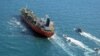 Boats from Iran's Islamic Revolutionary Guards Corps seize a South Korean-flagged tanker named Hankuk Chemi in the Persian Gulf on January 4.