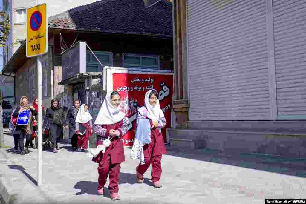 The school uniform for girls in Iranian Astara is a white hijab over a red pantsuit until seventh grade. After that, girls must wear a full black veil over all their clothes.